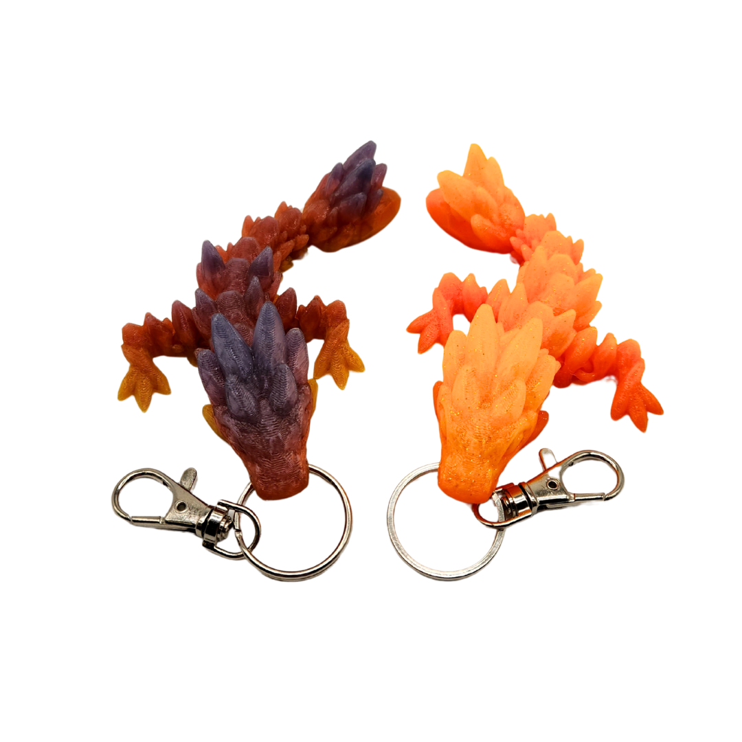 Ein Drachen Anhänger der wie ein Kristall Drache aussieht aber mit abgerundeten Ecken.