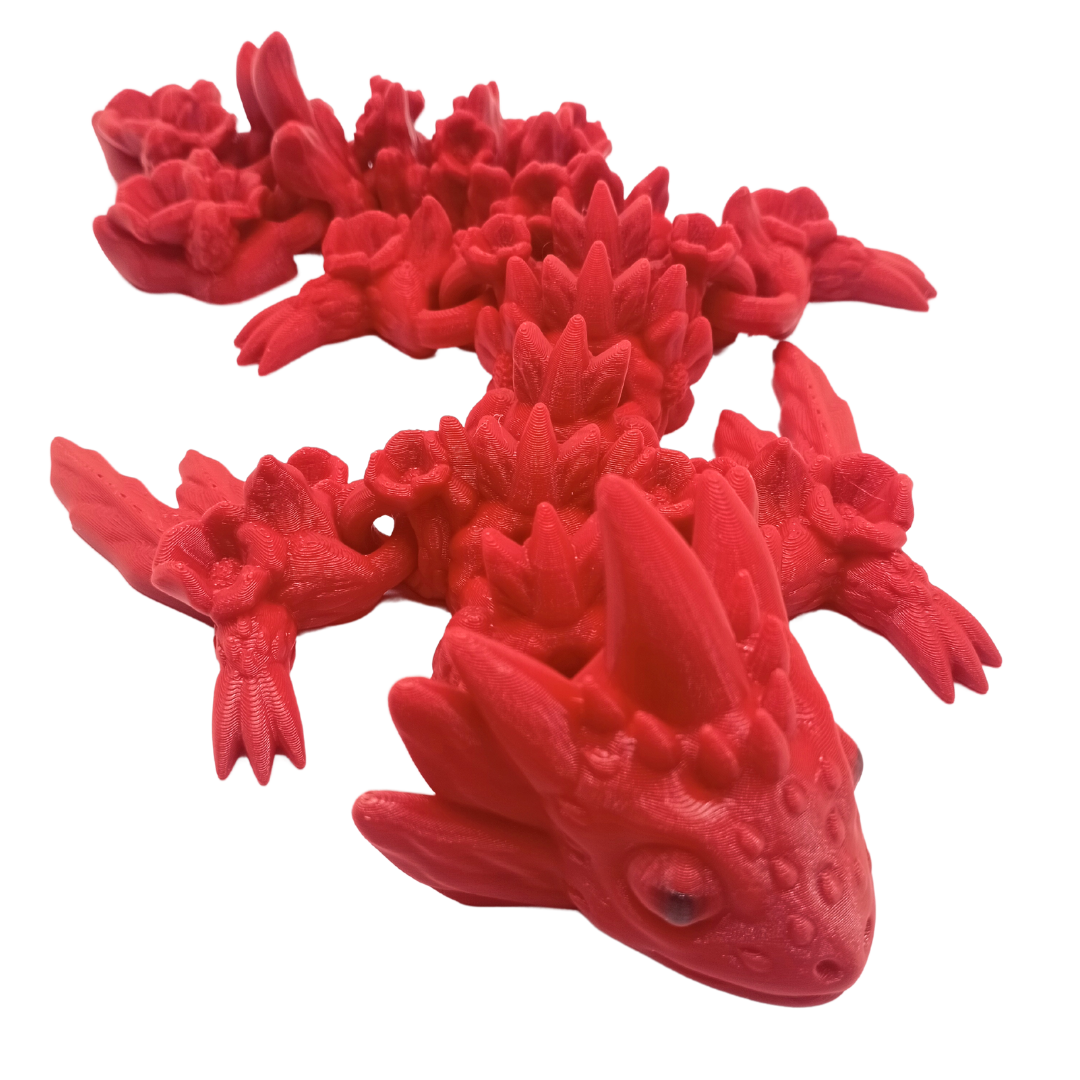 Ein Drache der verziert ist mit Erdbeer Blüten und Erdbeer Kernen